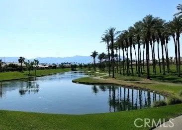 a view of a lake with a big yard