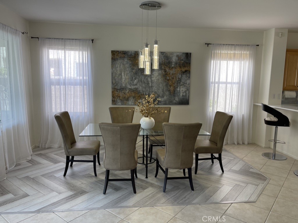 35330 Rosemont Drive Palm Desert, CA 92211 - Photo 4 of 38 a view of a dining room with furniture and chandelier