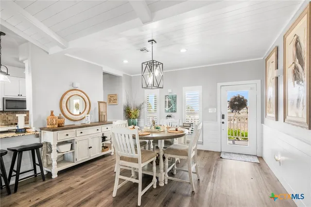 a living room with lots of furniture and view