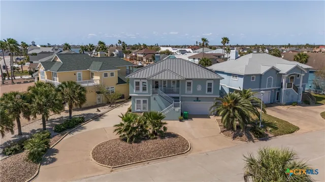 a view of a city with lawn chairs