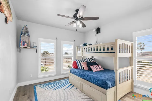 a view of a swimming pool with a potted plant