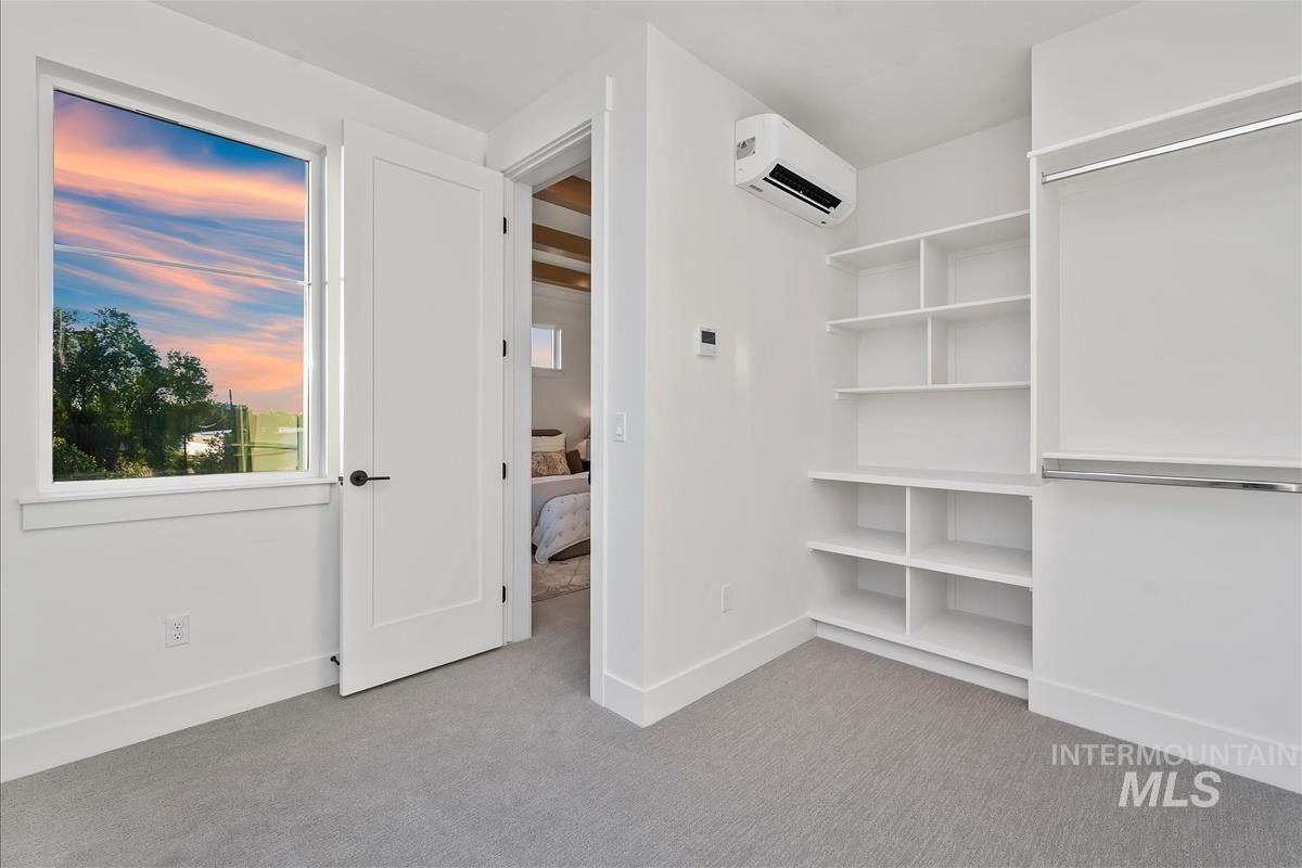 3219 West Moore Street Boise, ID 83702 - Photo 26 of 36 Room featuring light gray carpet flooring, white walls, and a single window with white trim