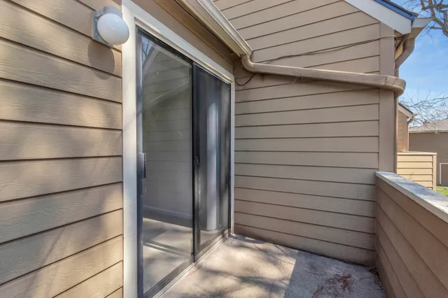 a bathroom with a toilet and bathtub