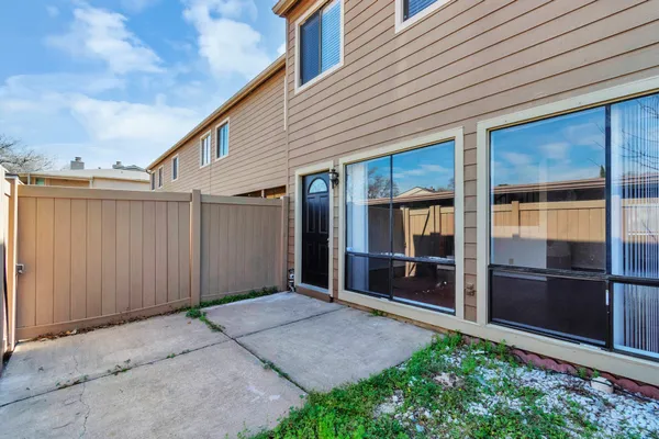 an aerial view of residential houses and outdoor space
