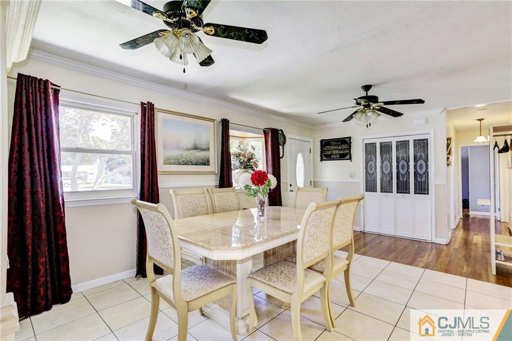 35 Clemson Road Old Bridge, NJ 08859 - Photo 11 of 25 a view of a dining room with furniture and chandelier