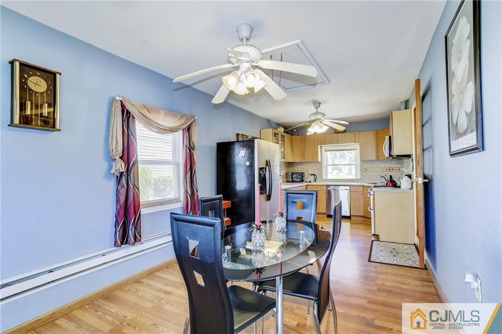 35 Clemson Road Old Bridge, NJ 08859 - Photo 14 of 25 a view of a dining room with furniture and chandelier