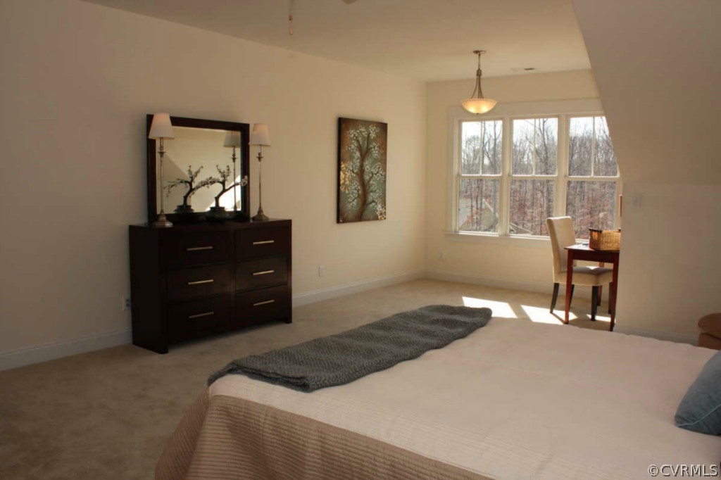 3324 Handley Road Midlothian, VA 23113 - Photo 12 of 24 a bedroom with a bed and wooden floor