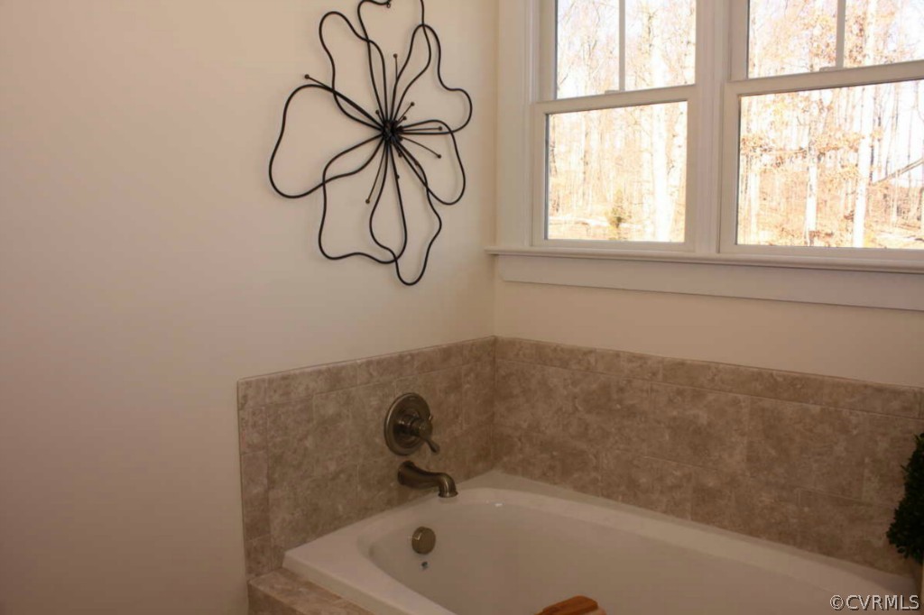 3324 Handley Road Midlothian, VA 23113 - Photo 13 of 24 a bath tub sitting next to a window