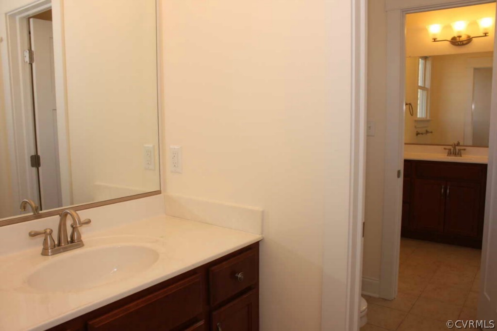 3324 Handley Road Midlothian, VA 23113 - Photo 14 of 24 a bathroom with a sink and a mirror