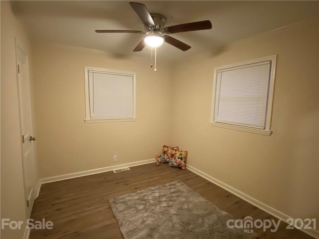 807 Park Road Dallas, NC 28034 - Photo 5 of 8 an empty room with a window