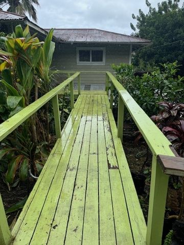 a view of balcony with wooden floor