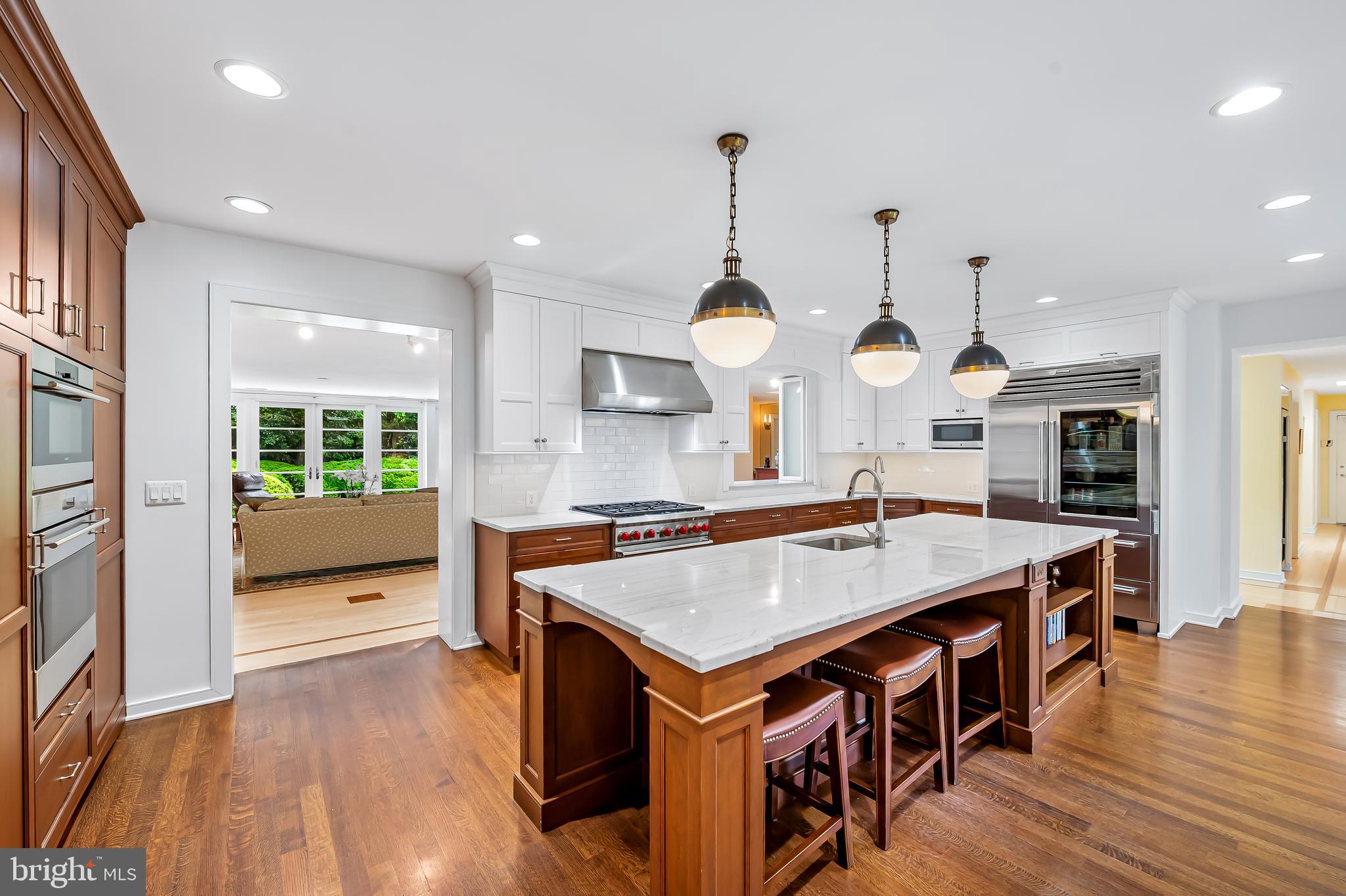 6 Meadow Road Baltimore, MD 21212 - Photo 13 of 53 a view of a kitchen with a table and chairs