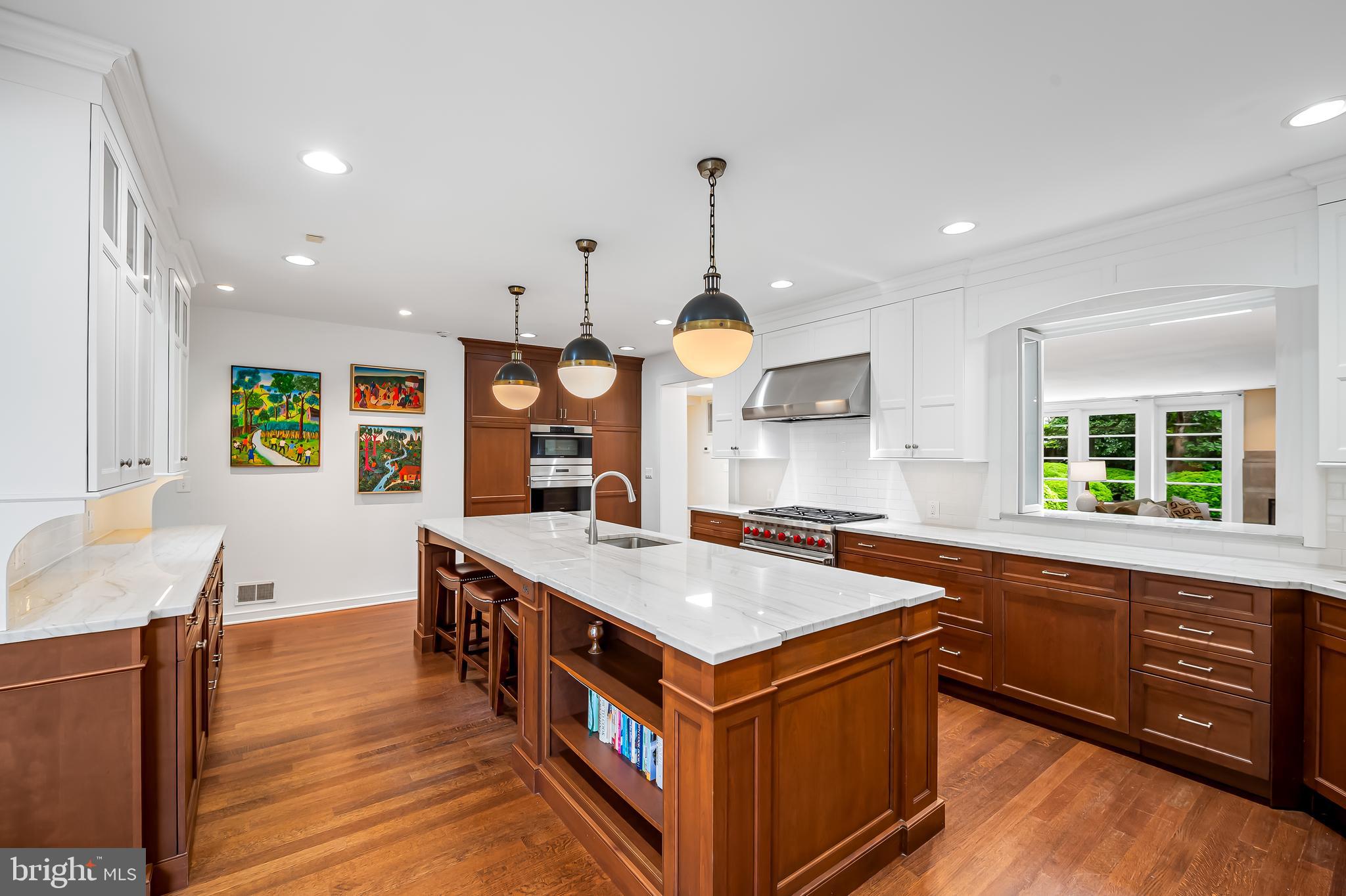 6 Meadow Road Baltimore, MD 21212 - Photo 15 of 53 a kitchen with stainless steel appliances granite countertop a sink and a wooden floors