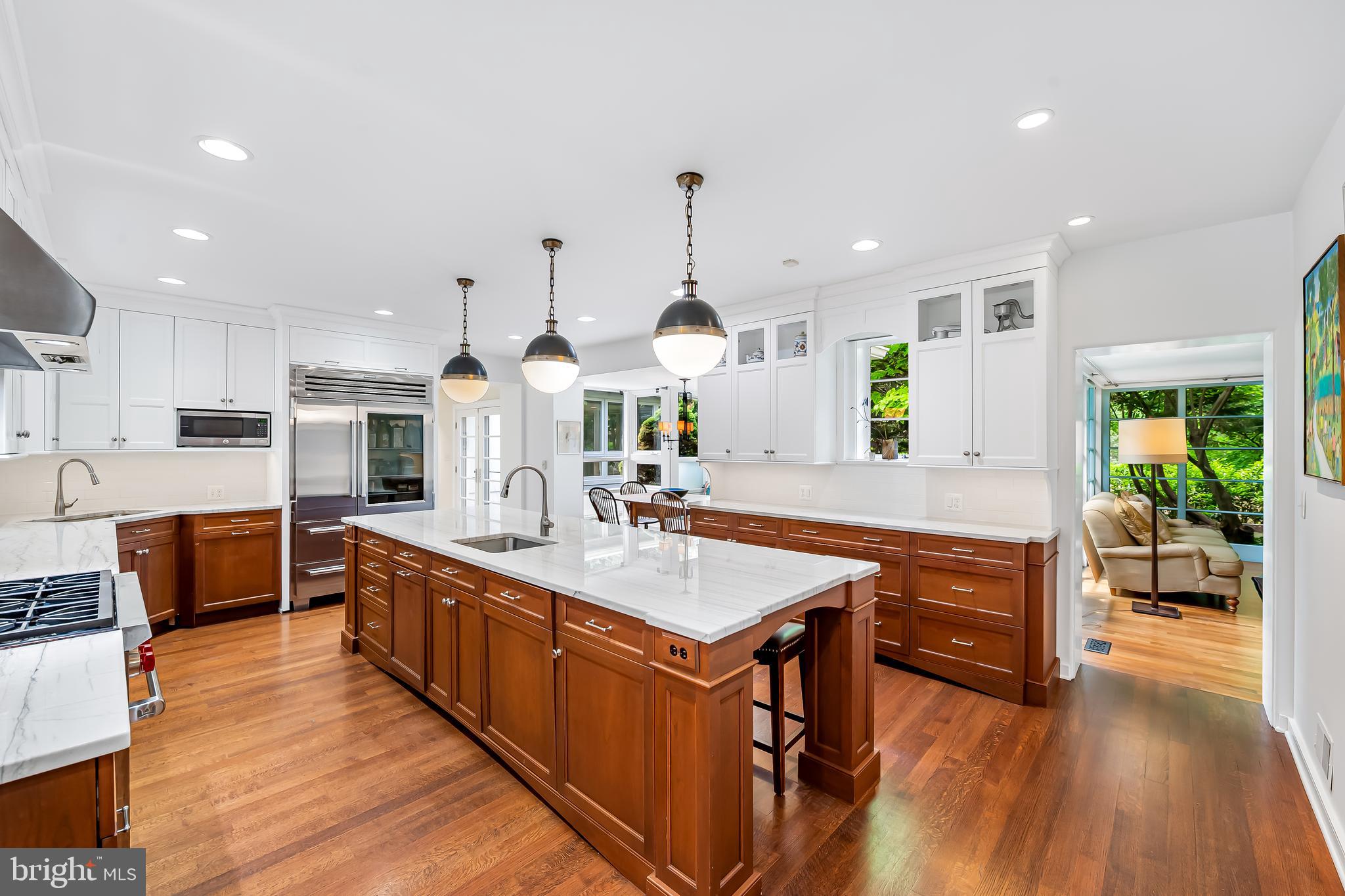 6 Meadow Road Baltimore, MD 21212 - Photo 20 of 53 a large kitchen with kitchen island a large island in the center