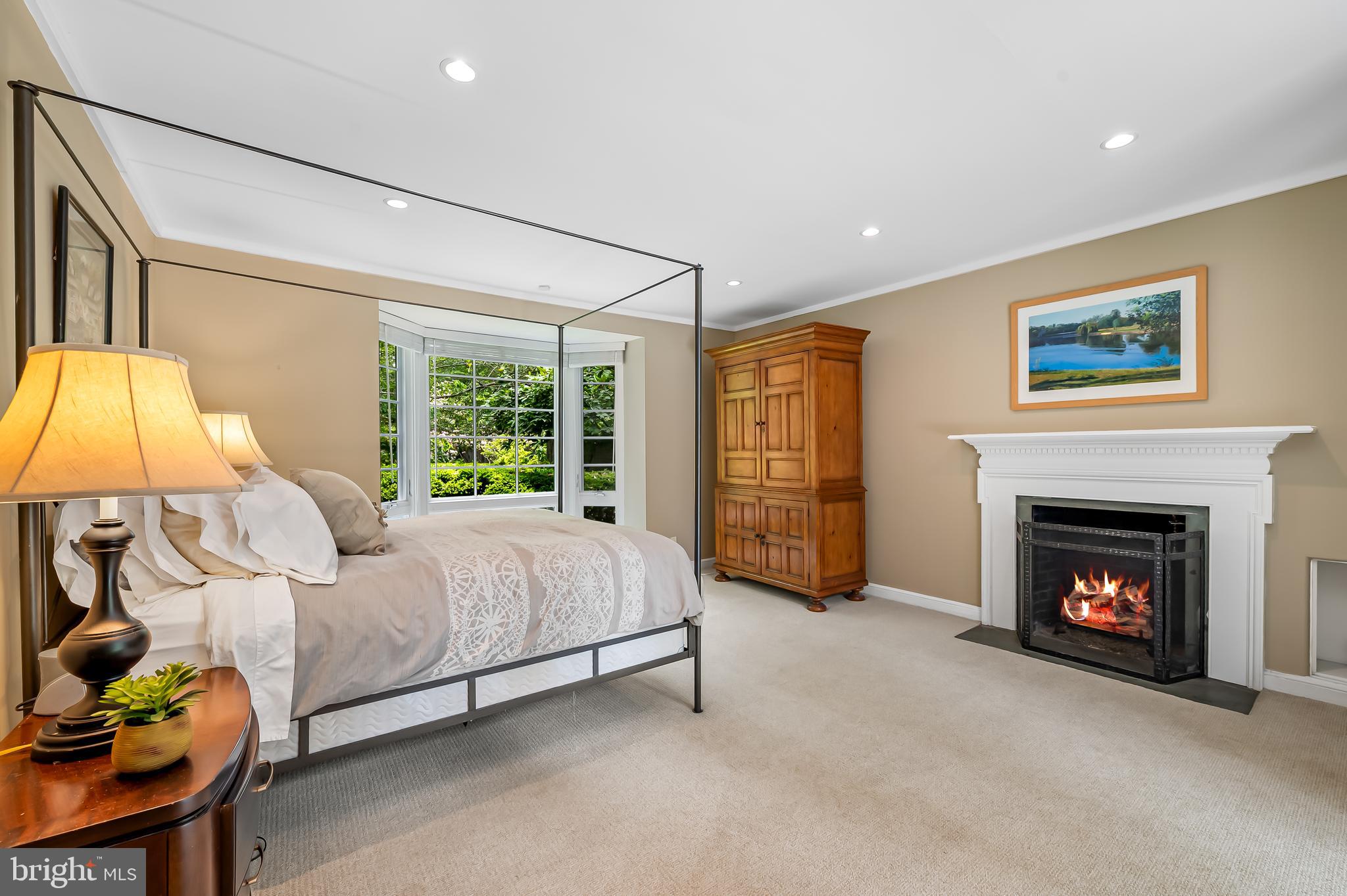 6 Meadow Road Baltimore, MD 21212 - Photo 28 of 53 a bed room with a bed and a fireplace