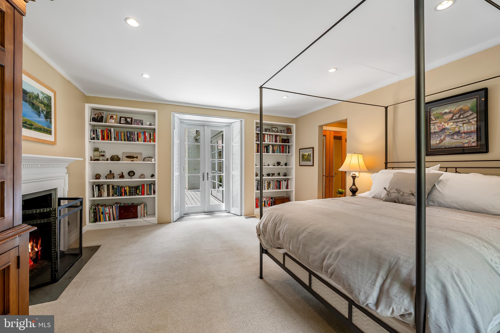 6 Meadow Road Baltimore, MD 21212 - Photo 29 of 53 a bedroom with a large bed and a flat tv screen