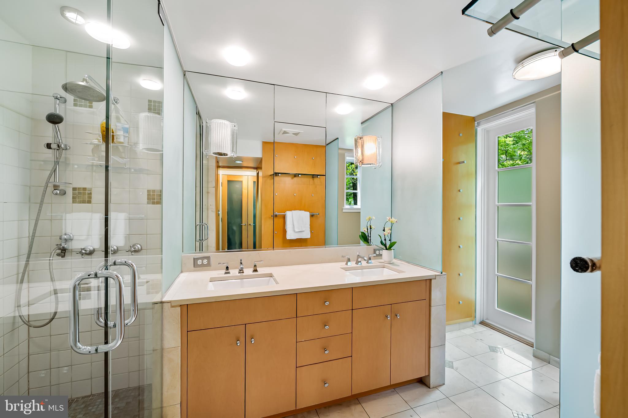 6 Meadow Road Baltimore, MD 21212 - Photo 31 of 53 a bathroom with a double vanity sink mirror and shower