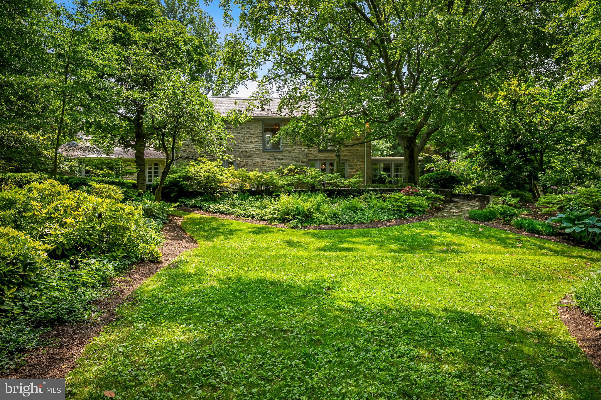 6 Meadow Road Baltimore, MD 21212 - Photo 43 of 53 a view of a big yard with plants and large trees
