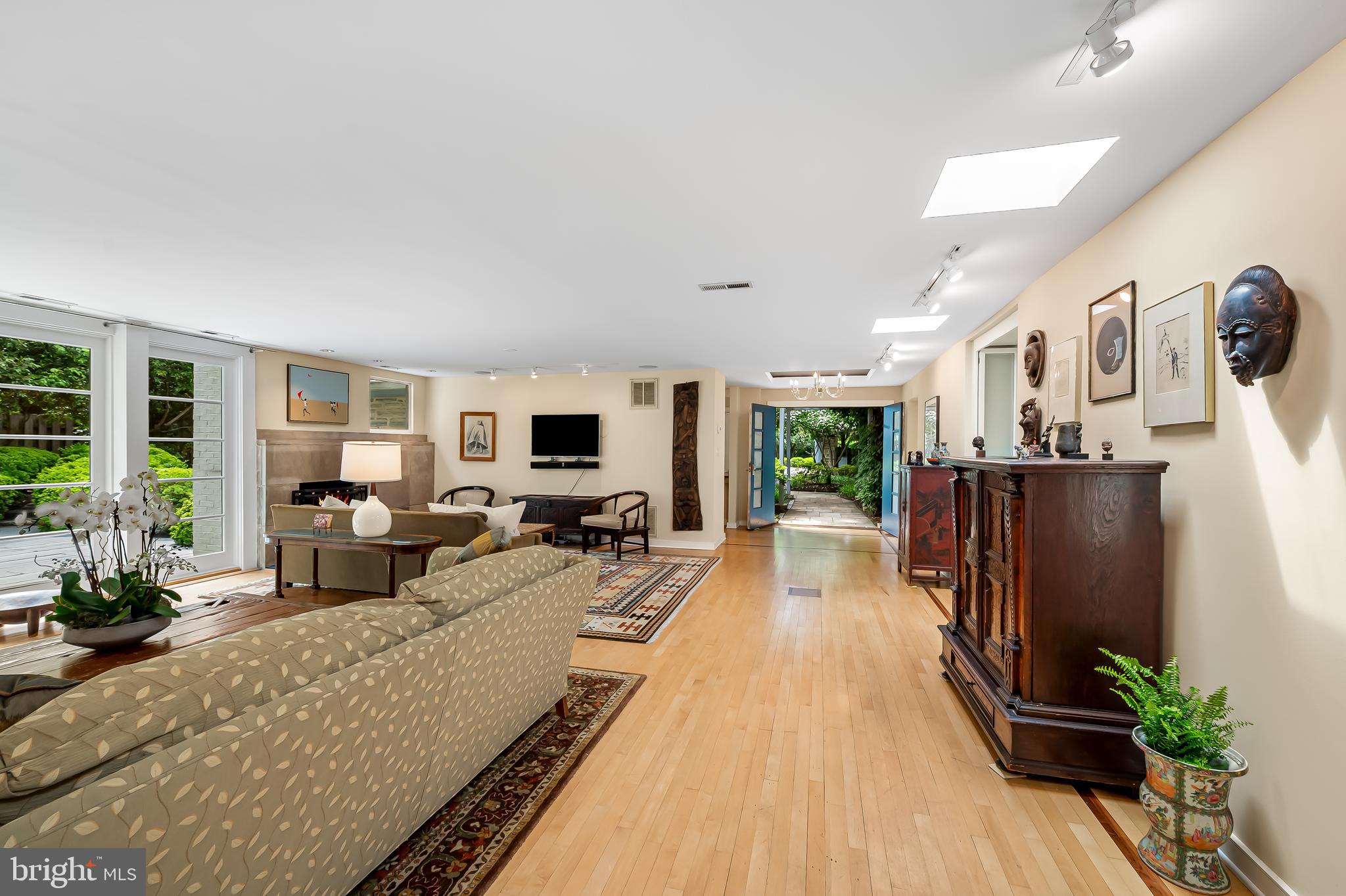 6 Meadow Road Baltimore, MD 21212 - Photo 7 of 53 a living room with furniture a large window with kitchen view