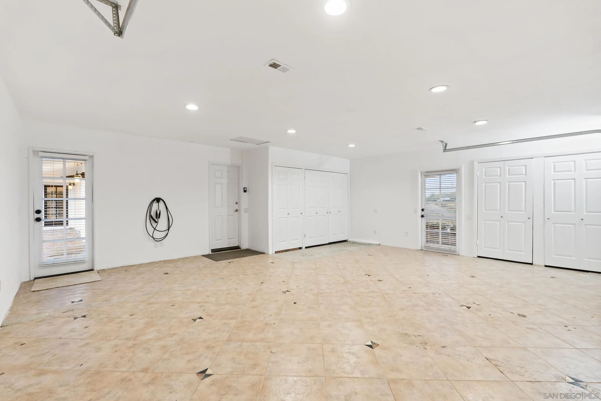 16551 Zumaque Street Rancho Santa Fe, CA 92067 - Photo 40 of 58 2-car garage with EV charger and storage