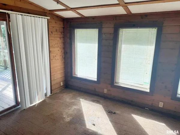 a view of a room that has a large window