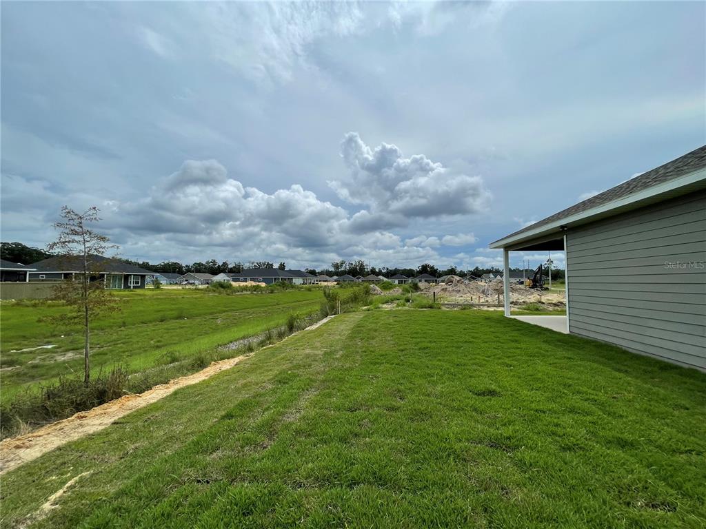 1021 Southwest 67th Street Gainesville, FL 32607 - Photo 38 of 53 a view of a lake with a big yard