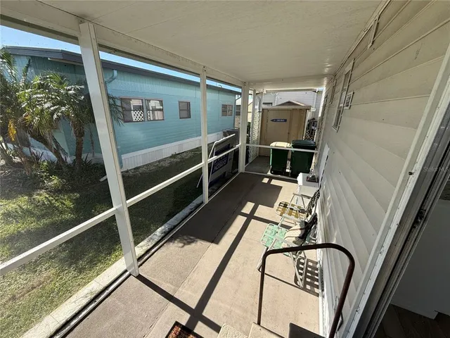 a view of swimming pool with seating area