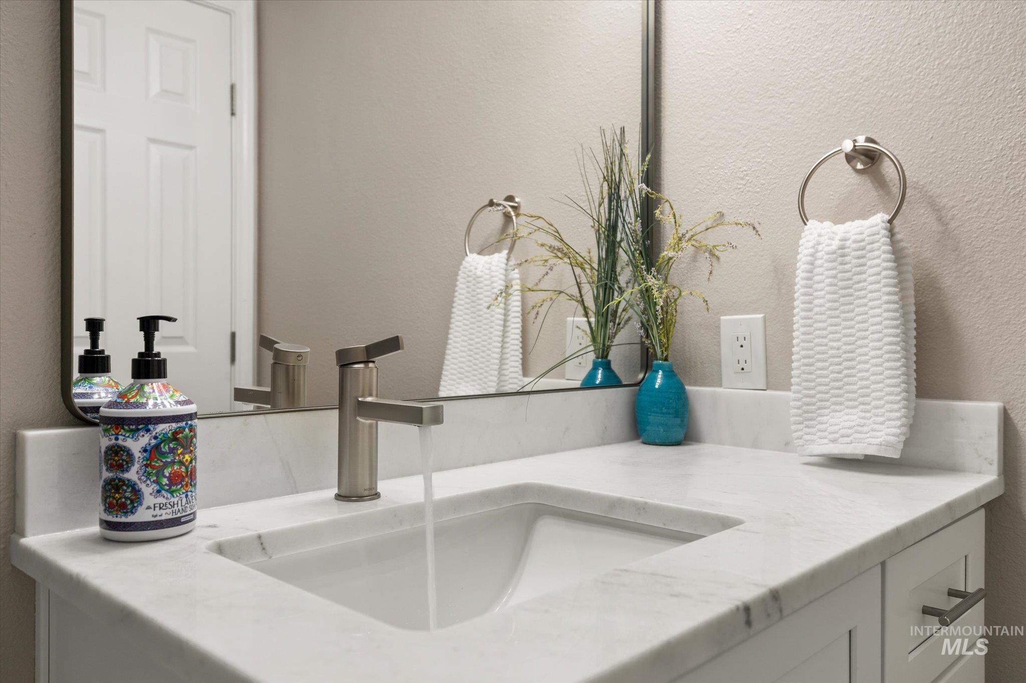 2250 North Amethyst Avenue Meridian, ID 83646 - Photo 41 of 50 Bathroom view of a textured wall and vanity
