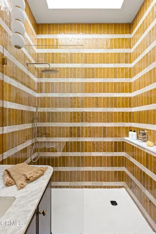 a view of a hallway with washer and dryer