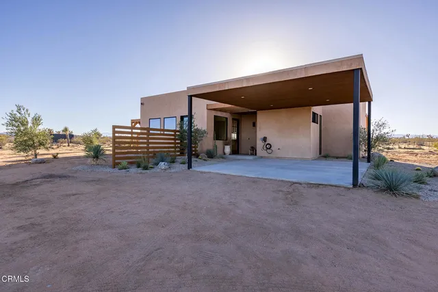 a view of a big room with wooden fence