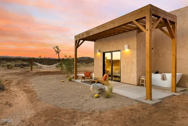 a view of a street with a building in the background