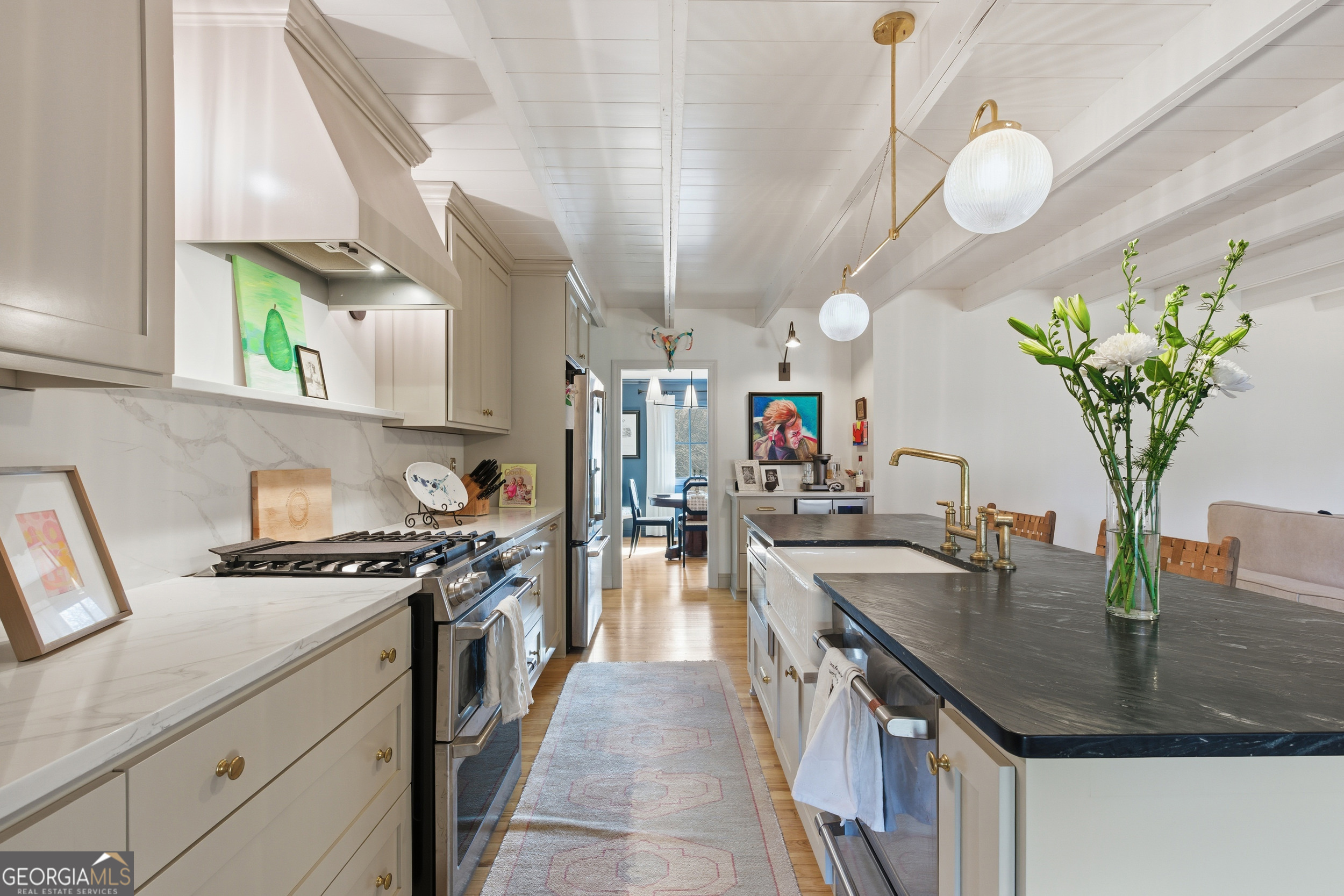125 Maple Street Cornelia, GA 30531 - Photo 13 of 44 a kitchen with sink stove and cabinets