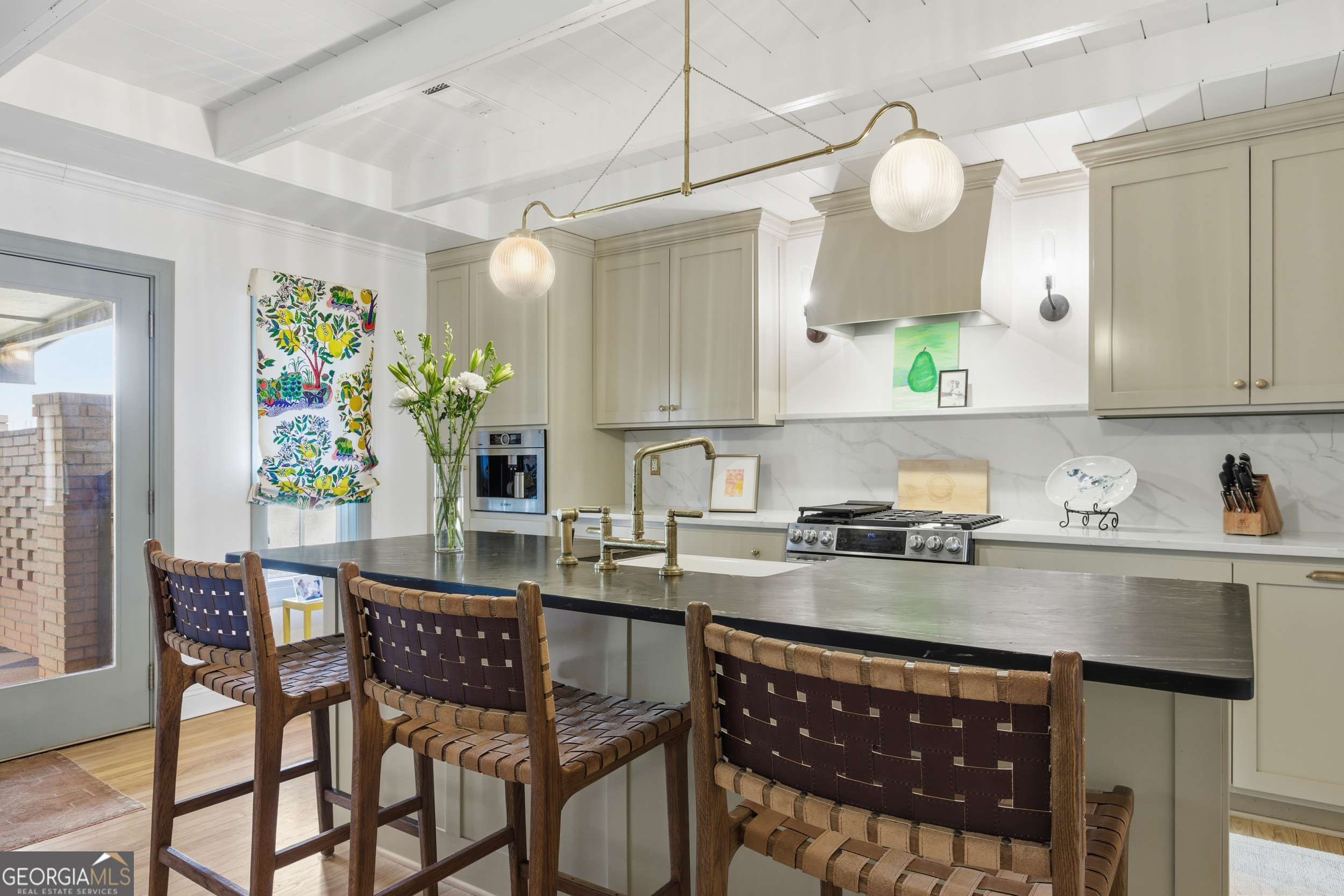 125 Maple Street Cornelia, GA 30531 - Photo 14 of 44 a kitchen with a table and chairs in it