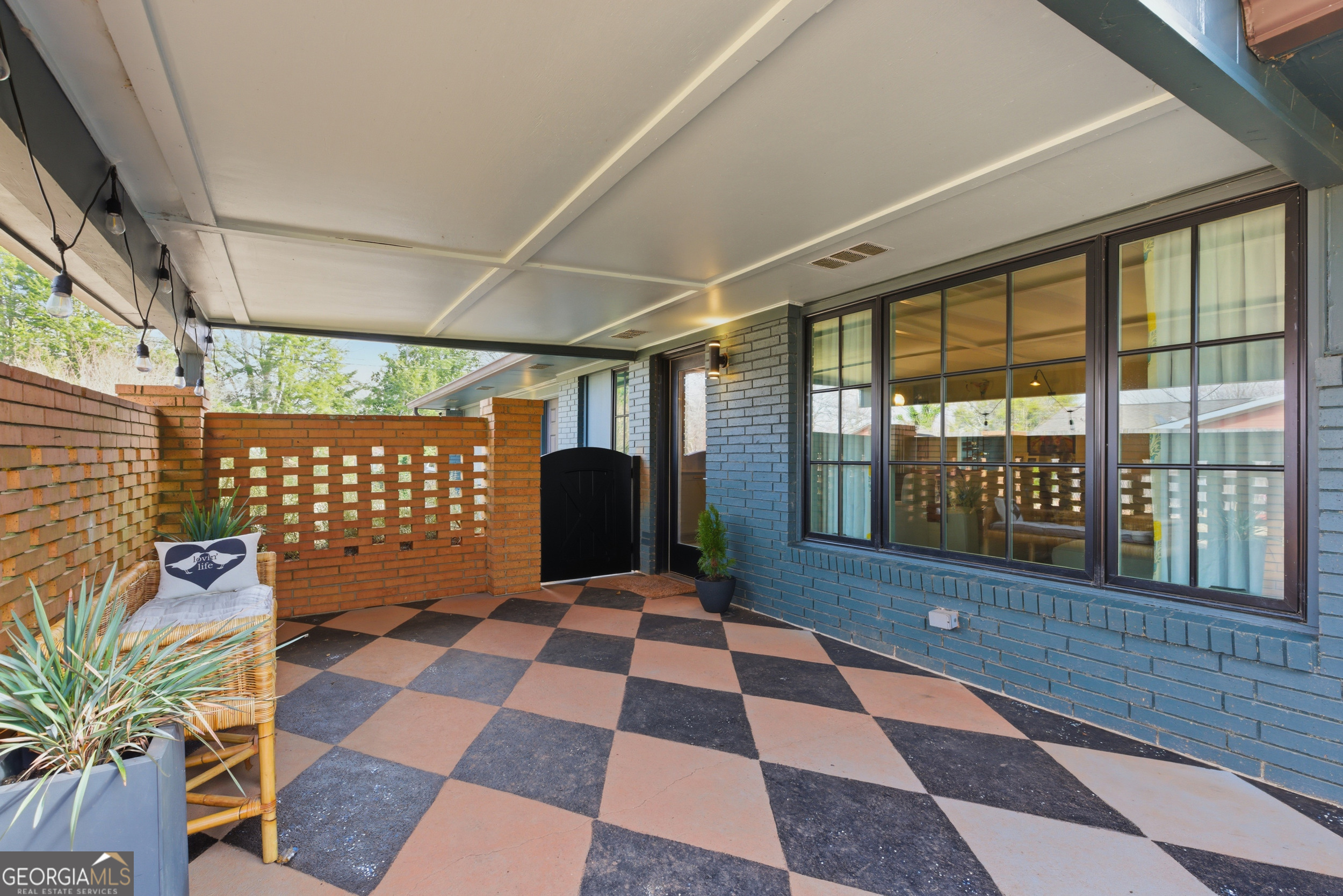 125 Maple Street Cornelia, GA 30531 - Photo 15 of 44 a room with a black white checkered floor with a black white checkered floor