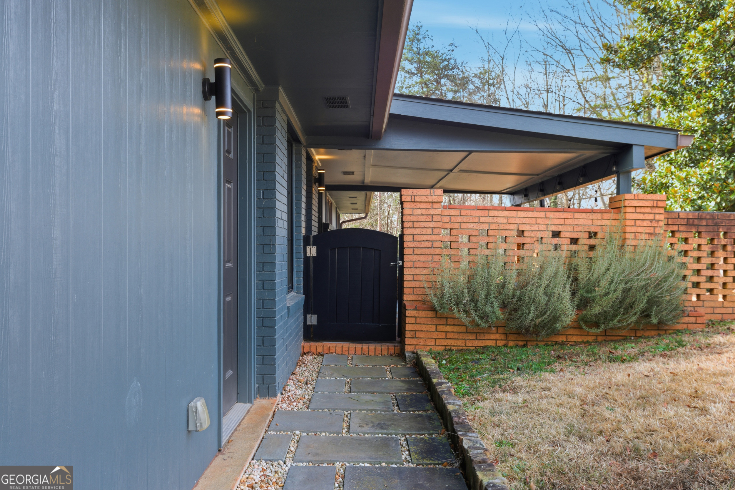 125 Maple Street Cornelia, GA 30531 - Photo 17 of 44 a view of a back yard of the house