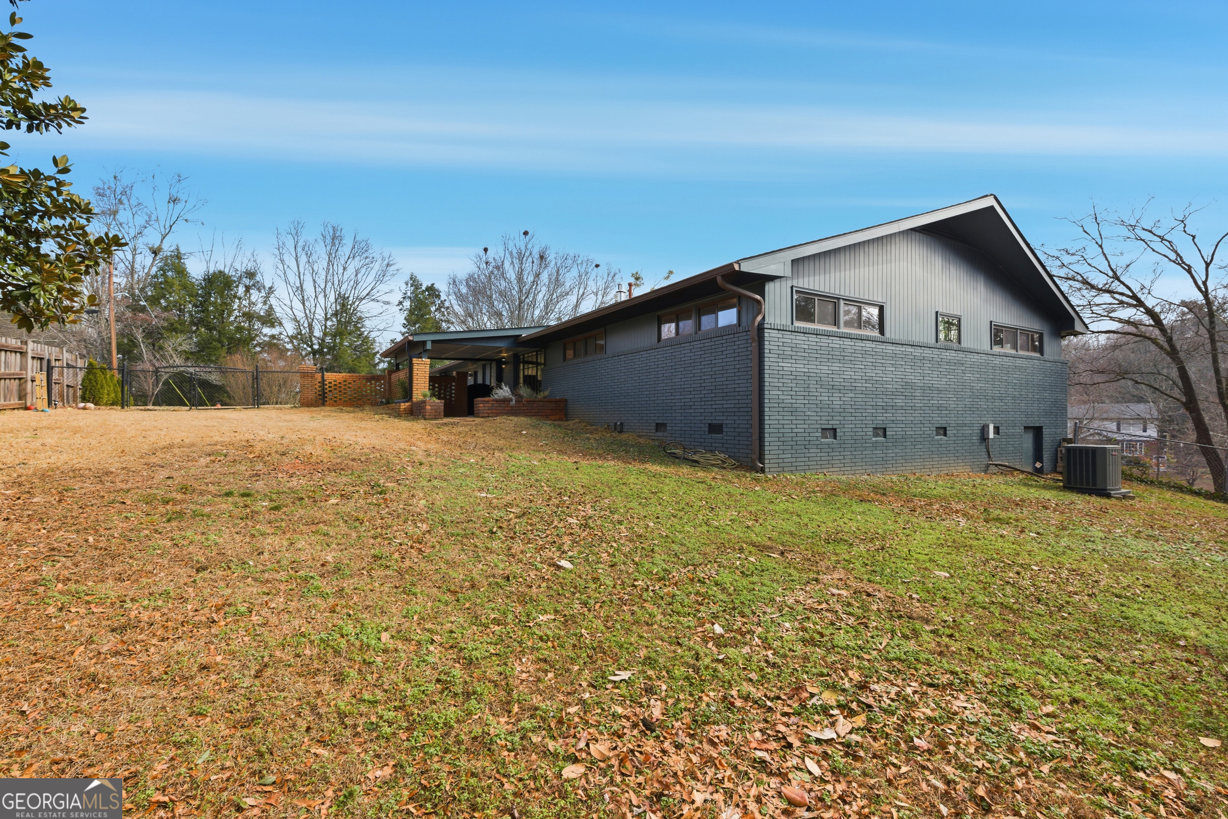 125 Maple Street Cornelia, GA 30531 - Photo 19 of 44 a view of a house with a yard