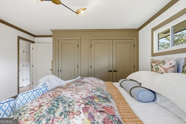 a bathroom with a tub a sink and a shower