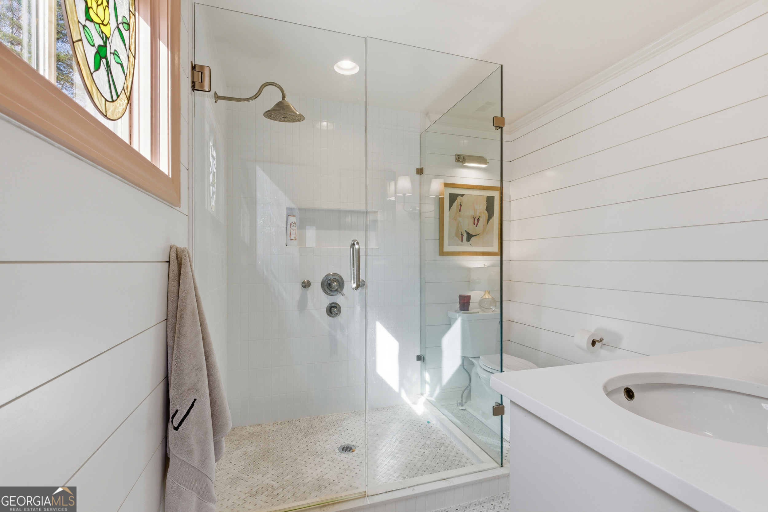 125 Maple Street Cornelia, GA 30531 - Photo 28 of 44 a bathroom with a tub a sink and a shower