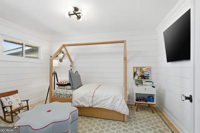 a bathroom with a sink mirror vanity and toilet