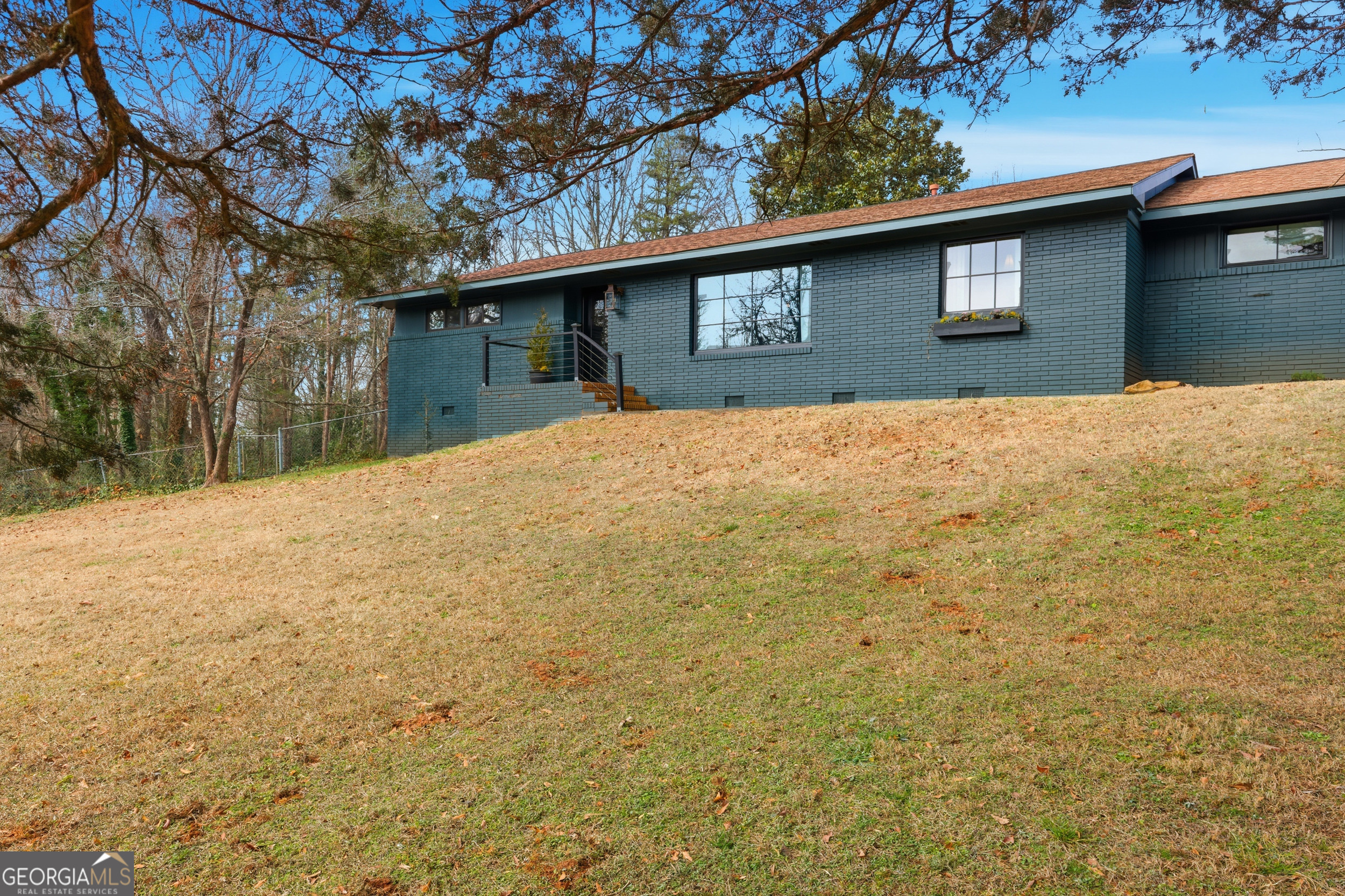 125 Maple Street Cornelia, GA 30531 - Photo 37 of 44 a front view of a house with a yard