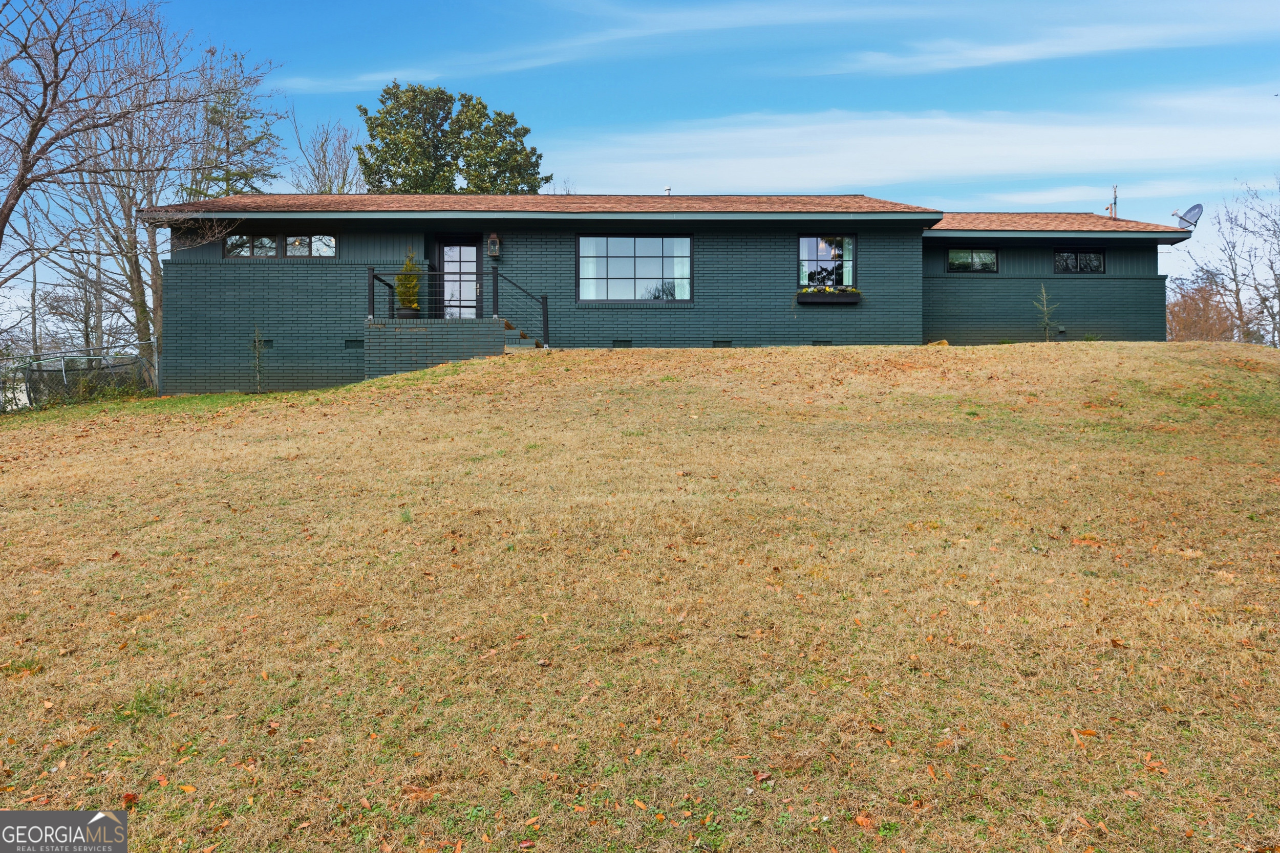 125 Maple Street Cornelia, GA 30531 - Photo 38 of 44 a front view of house with yard