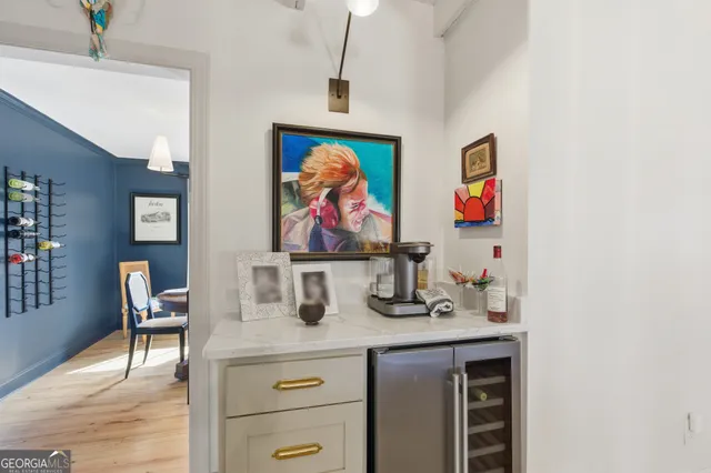 a table with chairs and a wooden floor