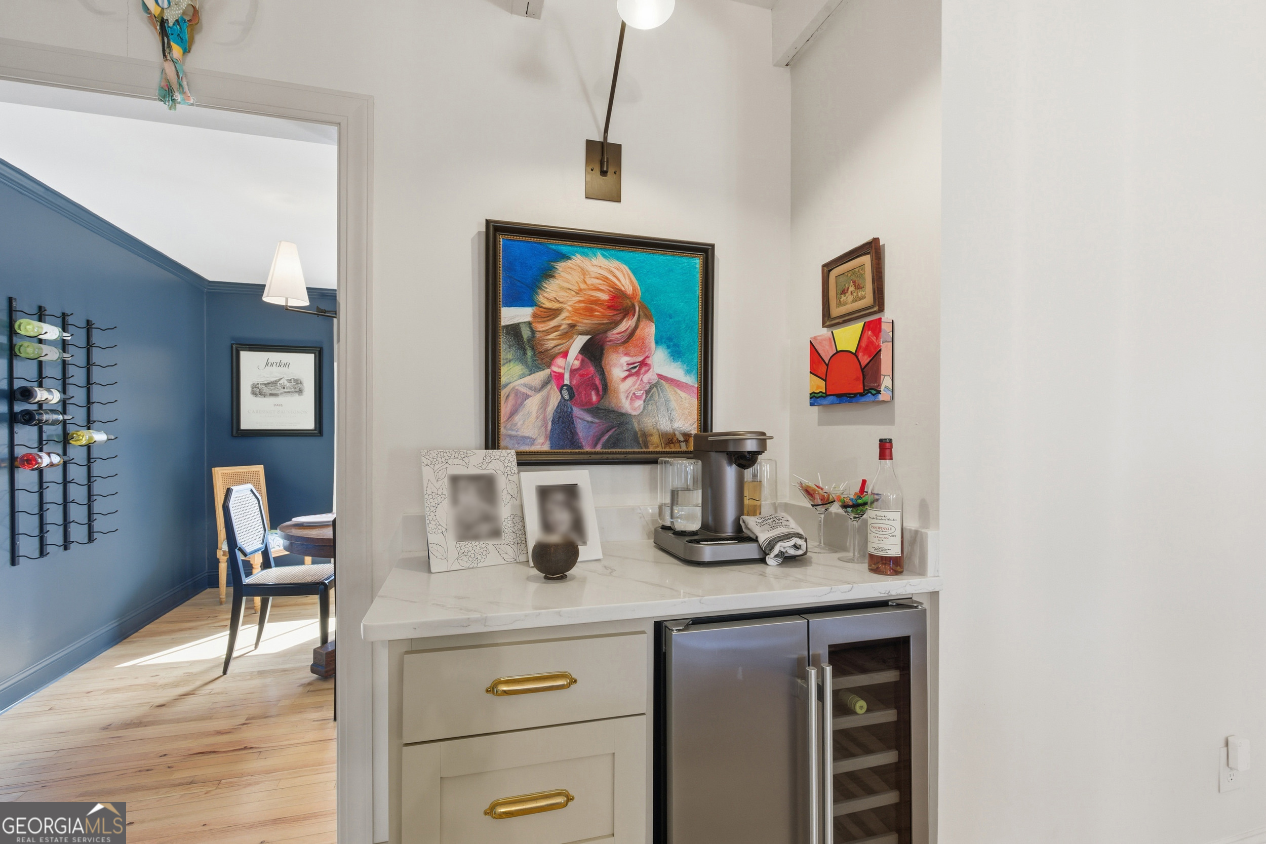 125 Maple Street Cornelia, GA 30531 - Photo 10 of 44 a table with chairs and a wooden floor