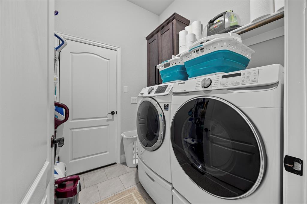 1084 Imperial Eagle Road Alvarado, TX 76009 - Photo 31 of 39 a utility room with dryer and washer