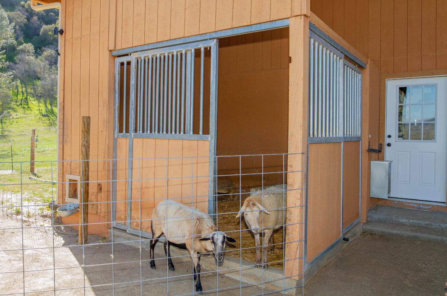 0 Apn Road, Unit 13836007 Clovis, CA 93619 - Photo 17 of 65 a view of a door and chair and table in the patio