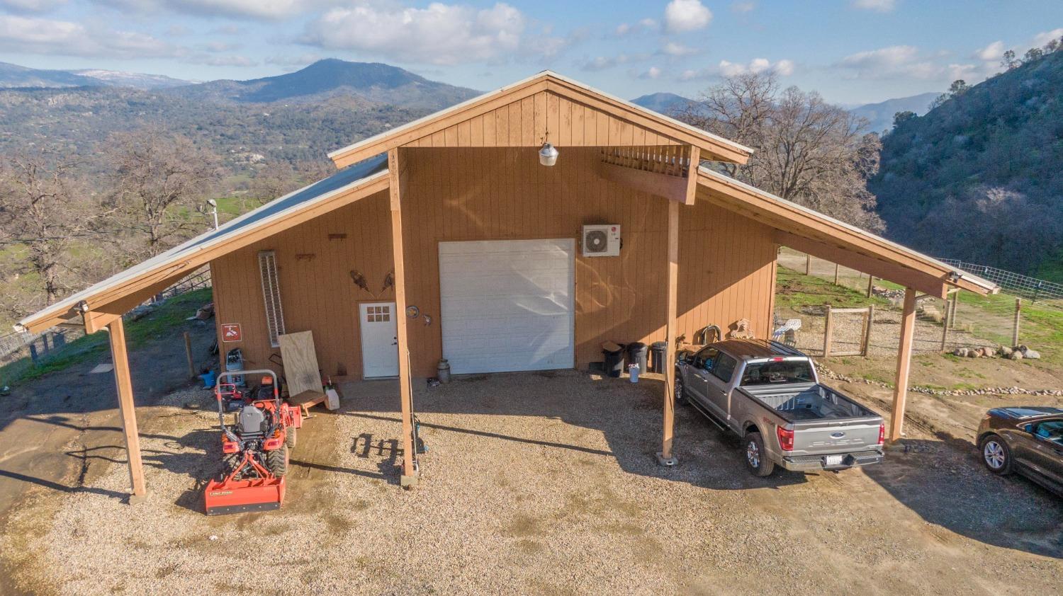 0 Apn Road, Unit 13836007 Clovis, CA 93619 - Photo 2 of 65 a view of a two room with wooden floor and iron fence
