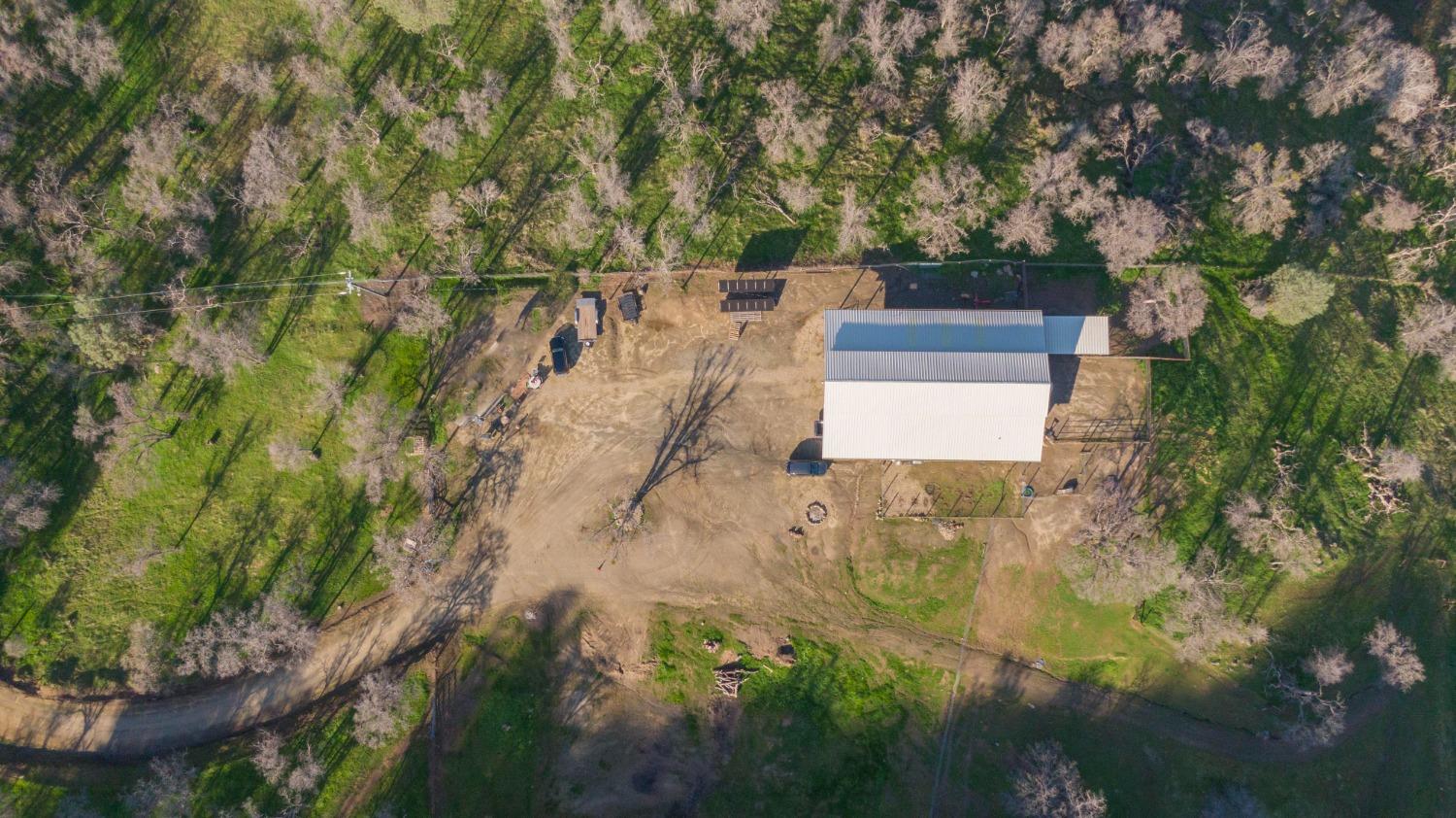 0 Apn Road, Unit 13836007 Clovis, CA 93619 - Photo 10 of 65 aerial view of a house with a yard