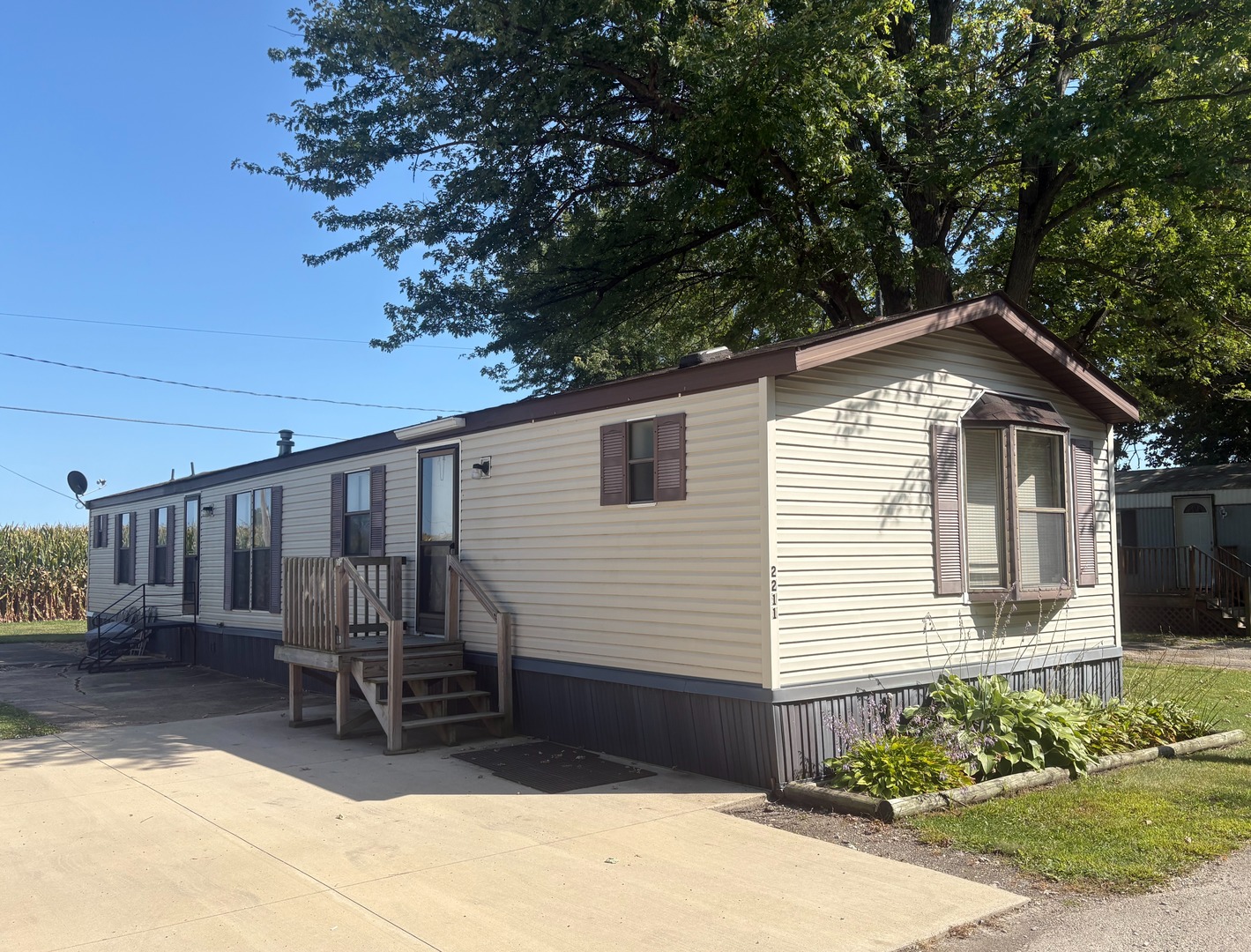 2211 Crestview Drive Princeton, IL 61356 - Photo 1 of 23 a front view of a house with garden