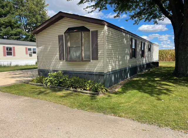 a front view of house with yard