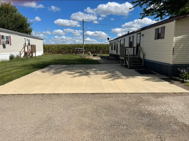 a view of a backyard of the house
